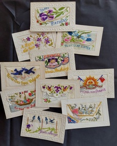 10 beautiful hand embroidered silk postcards from WW1 sent home to loved ones. Two Christmas cards included.