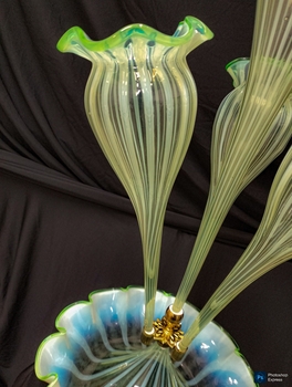 Bell shaped glass vase flute with scalloped edges . Green with white stripes slightly clouded
