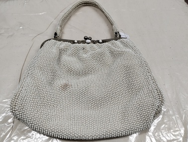 Accessory - White beaded handbag with decorative clasp