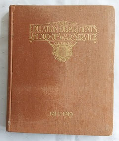 A tan hardcover book The Education Department's Record of War Service, Victoria 1914 - 1919.