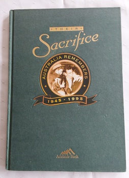 A dark green cloth hardcover titled in gold lettering, Their Sacrifice: Australia Remembers 1945 - 1995.
