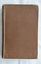 A brown hardcover textbook with black lettering on the spine with the title and author's surname. 