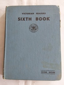A blue fabric covered hardcover with the title Victorian Reader Sixth Book printed in black lettering at the top of the front cover. 
