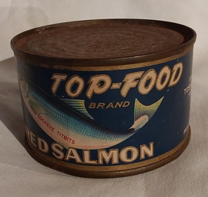An old unopened tin of Top-Food brand red salmon.