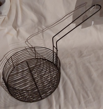 A medium sized vintage wire fish and chip fryer from the 1950's. 