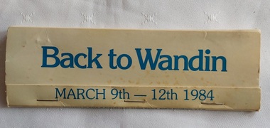 A white and blue long vintage paper matchbook from Wandin Victoria, Australia. 