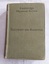 A light green cloth covered hardcover book titled, Electricity and Magnetism. 