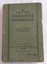 A green cloth hardcover book with the title printed in black text: The Weekly Times Farmers' Handbook on the front cover. 