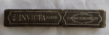 An empty brown cardboard vintage Invicta Cut Throat Razor case with silver details listed on the front.
