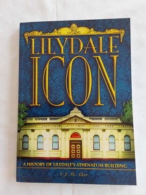 Three volumes of the book Lilydale Icon - A History of Lilydale's Athenaeum Building with covers of different coloured backgrounds.