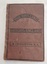  A small brown hardcover book with the title, The Shilling History of England stamped into the front cover in brown lettering.