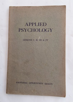 Seven different coloured covered small paperback textbooks of Applied Psychology - How to Change your Life, Lessons 1 - 22 over the seven books. 