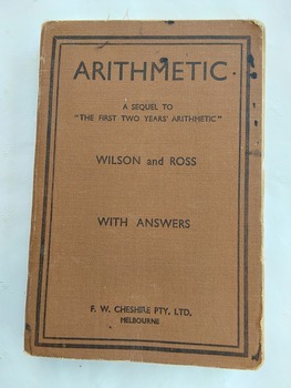 A tan coloured vintage 1947 reprint Arithmetic textbook - A Sequel to the First Two Years' Arithmetic With Answers.