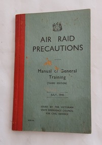 A small vintage blue covered book - Air Raid Precautions Manual of General Training.