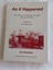 A white covered book with all information printed in red - the title, author and a photograph of farmers harvesting a crop.
