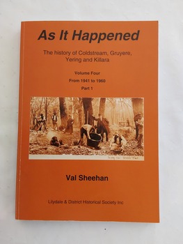 An orange covered book with details printed in black: the title, author and a sepia photograph of mining at David Mitchell's property near Steele's Flats. 