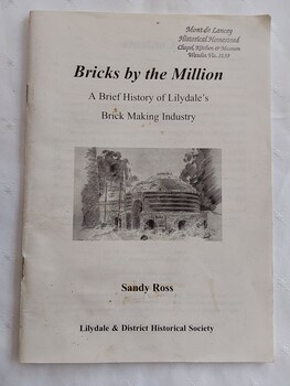 A small white book with publishing details printed in black on the cover and a black and white photograph of a drawing of an early brick kiln.