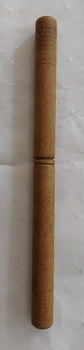 A vintage wooden turned two piece treen needle case with six rusted steel knitting needles.