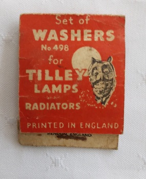 A small red cardboard matchbook style Set of Washers No 498 for Tilley Lamps and Radiators. 