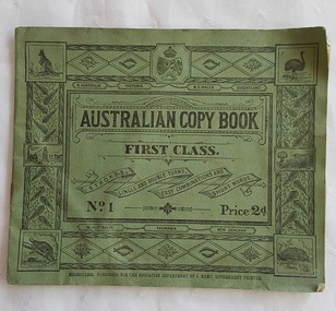 A slim green Australian Copy Book First Class. No.1 Price 2d. printed on the ornate front cover. 