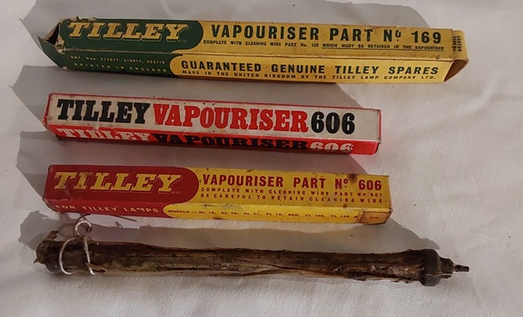 Four vintage Tilley Lamp Vapourisers (three new in boxes and one sealed in a plastic wrap).
