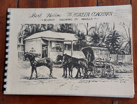 A cream rectangular paperback history book bound at the spine with spiral black plastic. The cover has an illustration of a horsedrawn coach on a dirt road.