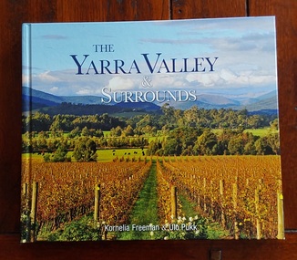 A colourful covered book showing a scene of beautiful vineyards in autumn in the Yarra Valley and surrounds approximately 40km from Melbourne. 