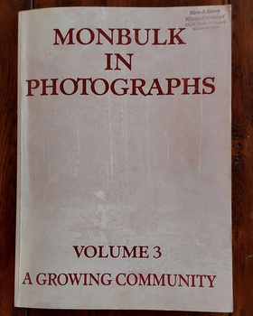 This volume 1 of a series of three titles has a pale pink front cover with a faint outline of a woman or child in the bush.