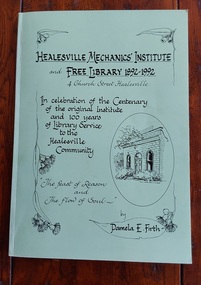 A green covered book with black lettering for the title, quotations and a sketch inside an oval shape of the Healesville Mechanics' Institute and Free Library 1892-1992.