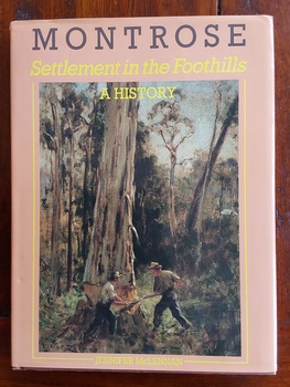 A brown book with an orange dust jacket which has a large coloured photograph on the front of a painting 'Tree Felling in the Dandenongs'.