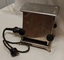 A vintage Hecla chrome plated steel two slice electric toaster on a footed base.