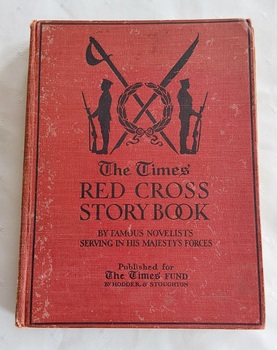 A red cloth covered book with the title printed in black with silhouettes of two soldiers standing each side of a wreath.