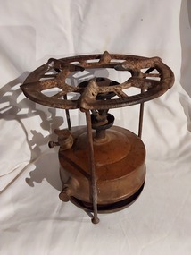 A vintage brass Primus Stove with operating knobs on both sides to turn the gas into vapour.