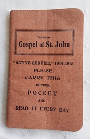 This faded red "Active Service" 1914-1915, The Pocket Gospel of St. John is a tiny, specialized scripture booklet distributed to British and Commonwealth troops during WW1.