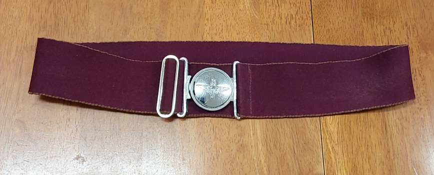 This is a 'Red Devils' maroon felt beret and webbing belt worn by WW2 paratroopers. 