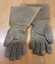 A pair of brown fur lined WW11 Luftwaffe flying gauntlets tapered at the wrist, and fitted with a narrow expandable wristband. 