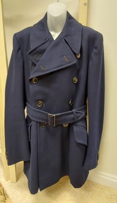 A calf length navy blue woollen RAF WW2 officer's double breasted greatcoat with a back vent opening. 