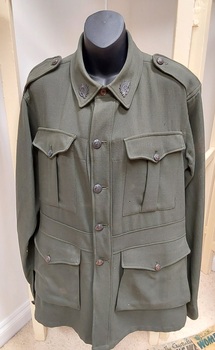 A WW 11 single-breasted green khaki cotton drill dress Volunteer Defence Force Corps jacket.