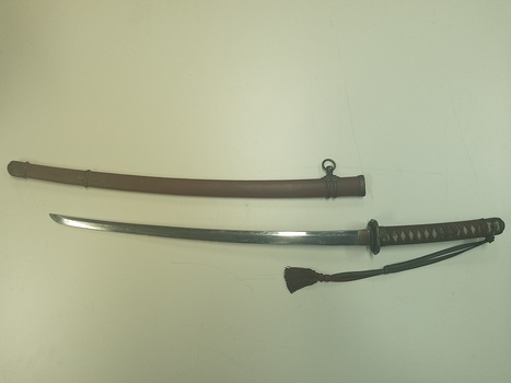 alternat side view of sword and scabbard
