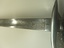 Detail view of base of blade showing makers mark
