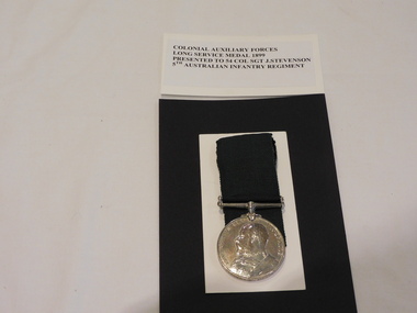 Medal - Colonial Auxiliary Forces Forces Long Service Medal . Presented to 54 COL SGT J.Stevenson 5th Australian Infantry Regiment