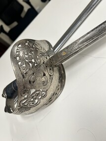 detail photo of hilt and lower blade, showing some pitting