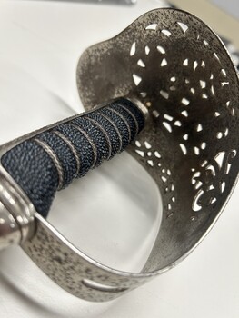 Detail photo of internals of hilt showing shark skin handel and pitting on the inside of hilt 