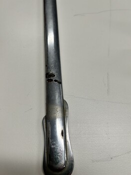 Photo of chromed scabbard, showing corrosion 