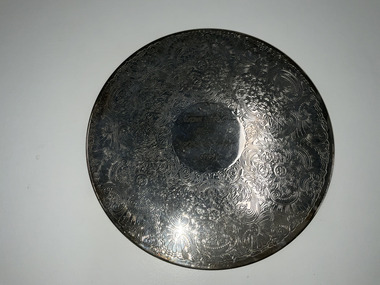 Domestic object - Silver place mat - SGT B. Cameron