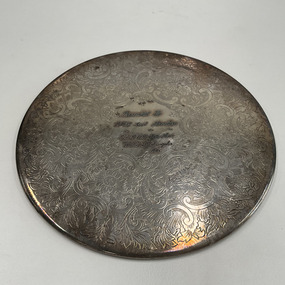 Domestic object - Silver Place Mat - WO2 E J Sungalis 1985