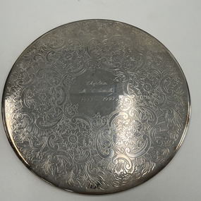 Domestic object - Silver place mat - Chaplain M C Smith