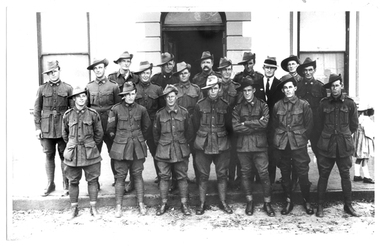 Photograph of soldiers in uniform in front of Victoria Hotel, Tarnagulla, Soldiers in uniform in front of Victoria Hotel, Tarnagulla, 8th November, 1919, 8 November 1919