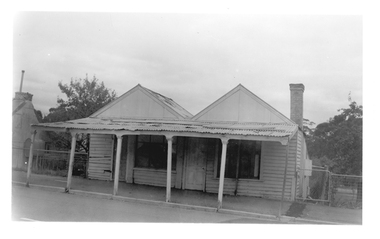Photograph of double-fronted weatherboard shopfront, Tarnagulla, Late 1960s
