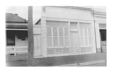 Photograph of latticed shopfront at 98 Commercial Rd, Tarnagulla, Late 1960s